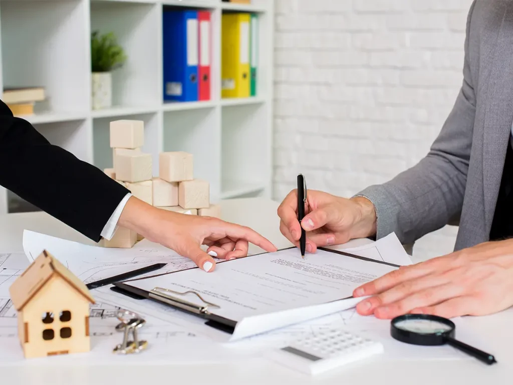 Signing an agreement for Owners Corporation Management Melbourne.